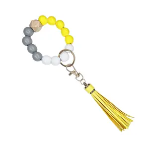 Bracelet perlé en Silicone, porte-clés, porte-clés, chaîne pour femmes avec pompon en cuir