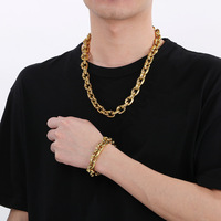 Ensemble de bijoux pour homme en acier inoxydable et acier titane, avec fermoir de jour, chaîne à maillons 'nez de cochon' et assemblage bicolore, comprenant bracelet et collier