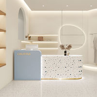 Comptoir de réception pour spa personnalisé multicolore à DEL Comptoirs de réception pour salon de beauté au design minimaliste pour salon de coiffure