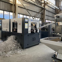 Machine de soufflage par étirage de plastique à bas prix pour préformes PET, pour l'emballage de bouteilles de boissons de 500 ml, certifiée CE