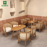 Juego de mesa y sillas de café de alta calidad, sillones de ratán de restaurante modernos nórdicos adecuados para muebles de restaurante y cafetería