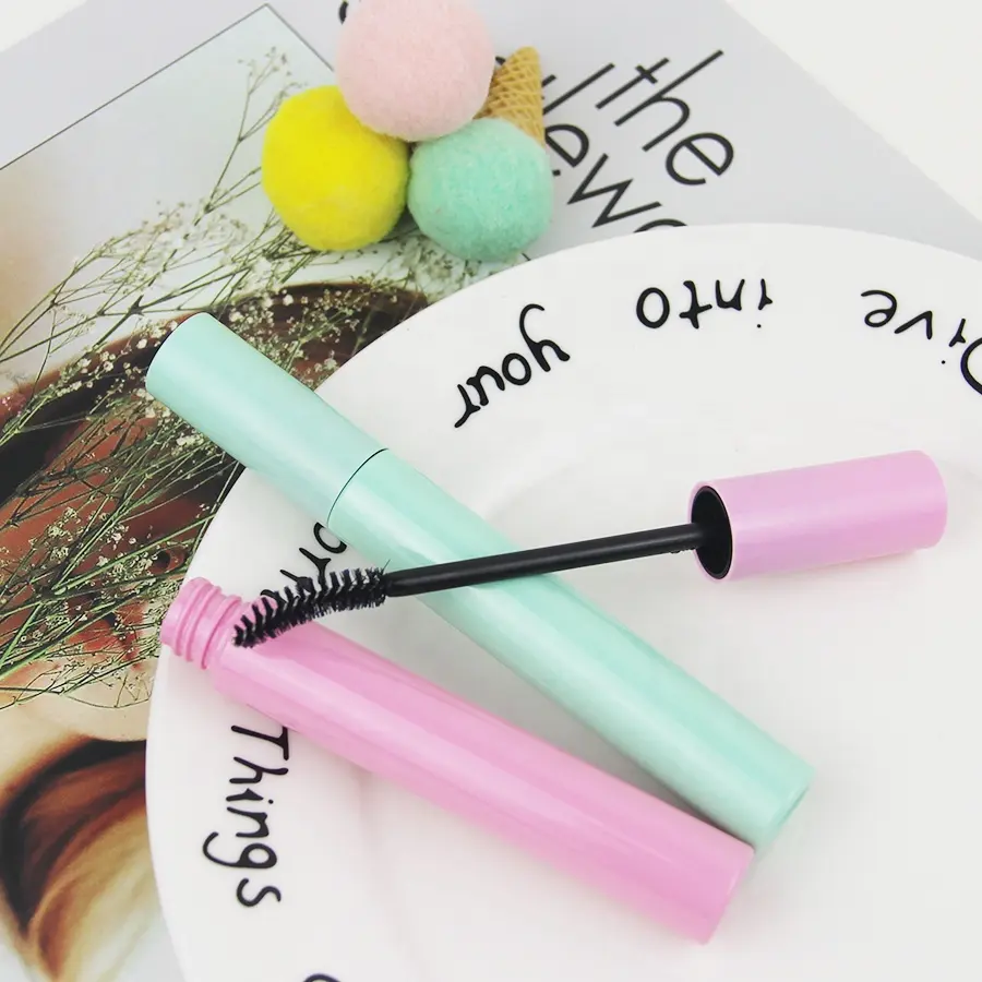 Hot sale pink green round empty plastic packing empty trendy mascara tube with brushes