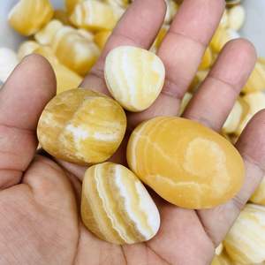 <span class=keywords><strong>Pietra</strong></span> burattata di <span class=keywords><strong>Calcite</strong></span> arancione di Spar islandese di miele giallo all'ingrosso in vendita - Product Image 4