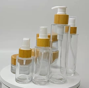 Envase de Lujo para Set de Cosméticos y Cuidado de la Piel de 20ml-150ml, Botella de Vidrio Transparente Esmerilado con Pulverizador para Suero Facial y Loción Corporal, Tapa de Bambú - Product Image 1