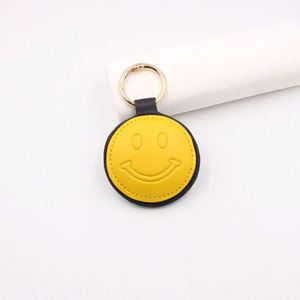 Porte-clés rond en cuir PU, breloque de sac élégante et durable, pendentif coloré et portable, cadeau promotionnel - Product Image 3