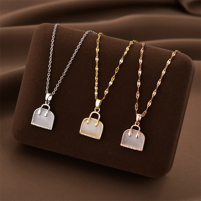 Cross-border Fashion High-end Design Cats Eye Stone Bag Pendant Titanium Steel Necklace Womens Simple And Elegant Collarbone Cha