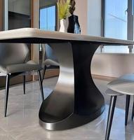 Table à manger moderne en pierre frittée résistante à la chaleur avec pieds en métal assemblés pour la maison et l'hôtel