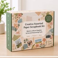 Kit de scrapbooking créatif en papier assorti avec boîte, offrant des fournitures pour album de souvenirs et des outils de décoration de journal pour l'affichage en magasin