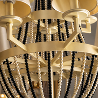 Lustre de luxe de style américain moderne en acier inoxydable doré et cristal K9 avec base d'ampoule E12 pour la décoration d'hôtels et de villas