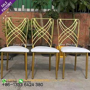 ราคาขายส่ง เฟอร์นิเจอร์โบราณ เก้าอี้จัดเลี้ยงแบบซ้อนได้ โครงเหล็กสีทอง สำหรับงานแต่งงานในโรงแรม - Product Image 1