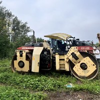 Vente de liquidation : Rouleau compresseur à double tambour Dynapac CC522 d'occasion 2010 avec cabine complète pour projets routiers en asphalte
