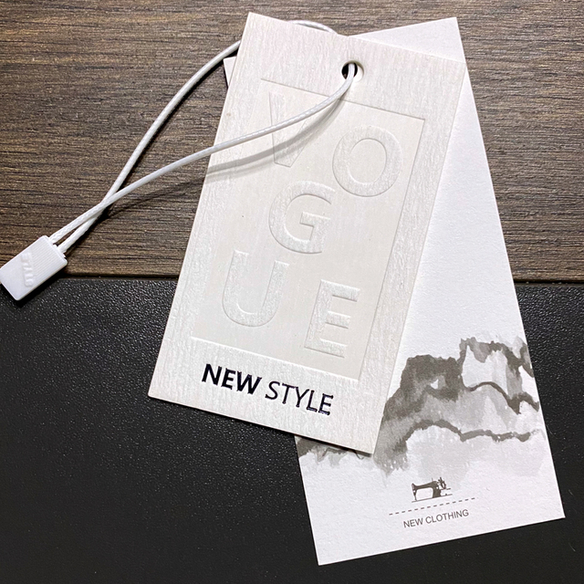 High-quality Eco-Friendly Customizable Paper Clothing Tags for Bags Shoes High-end Coat Special Debossed Logo Swing Tag Garment