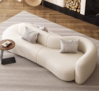 Canapé modulaire Chesterfield en cuir double face de designer, forme unique, pour salon, sensation de luxe léger et haut de gamme