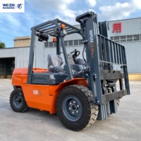 Chariot élévateur diesel WGZN à forte capacité de charge (11000 lb) pour la manutention de matériaux en extérieur, avec système hydraulique haute performance.