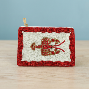 Pochette rouge perlée avec centre blanc et fermeture éclair dorée, accessoire de mode - Product Image 2