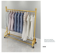 Porte-vêtements sur roulettes de style minimaliste nordique, support de rangement pour vêtements sur pied, adapté aux chambres à coucher