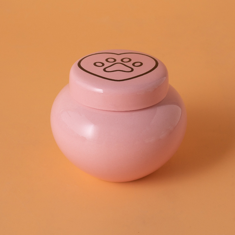 Round ash urn-pink-black heart paw print