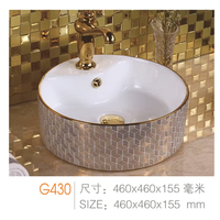 Lavabo de salle de bain en céramique dorée avec impression florale de forme ronde