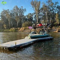 Tapis d'eau flottant gonflable vert à point de goutte pour le stationnement des bateaux