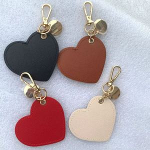 Llavero de cuero PU en blanco al por mayor, minimalista, bonito, para mujer, regalo de San Valentín, colgante de bolso con forma de corazón - Product Image 3