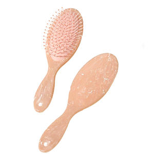 2025 ecológico nueva moda diseño único cojín de aire desenredante cepillo para el cabello húmedo y seco cepillo de pelo de mármol peine - Product Image 5