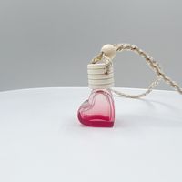 Diffuseur de parfum pour voiture en verre 5ml, pendentif suspendu en forme de cœur avec design coloré, bouchon en bois et cordon