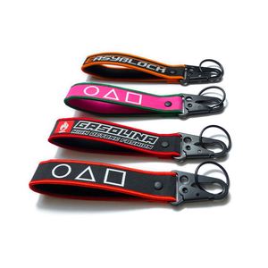 YUEWEN Promotional Gifts <b>Custom</b> Cheap Jet Tag Fabric Embroidery Car Keychains Woven Keychain - Product Image 1