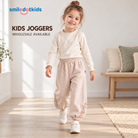 Smiledotkids Pantalon de jogging personnalisé pour enfants, rose, avec volants latéraux, taille boutonnée, en polaire douce, OEM ODM, vêtements en gros pour petites filles, nouveauté