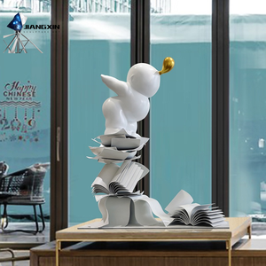 Escultura de esquina de lectura-Niño de dibujos animados de fibra de vidrio trepando en la base de Libro Abierto para librerías y bibliotecas - Product Image 1