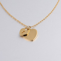 Nouveau design, collier pendentif cœur en acier inoxydable de haute qualité, vente en gros, collier avec fermoir concentrique pour couples