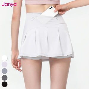 Janya 2-en-1 Mini falda deportiva de entrenamiento transpirable de cintura alta A-Line bolsillo oculto plisado personalizado Yoga Golf tenis mujeres niñas - Product Image 1