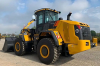 Pelle de chargement 848H : Interface d'attachement polyvalente, configuration flexible pour la manutention de pierre, de terre et de matériaux de construction