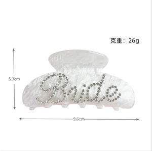 Venta caliente Barrettes Rhinestone Novia Logo Novia Garra Clip Acrílico Pinzas para el cabello para <span class=keywords><strong>despedida</strong></span> <span class=keywords><strong>de</strong></span> <span class=keywords><strong>soltera</strong></span> Decoración Regalos <span class=keywords><strong>de</strong></span> dama <span class=keywords><strong>de</strong></span> honor - Product Image 2
