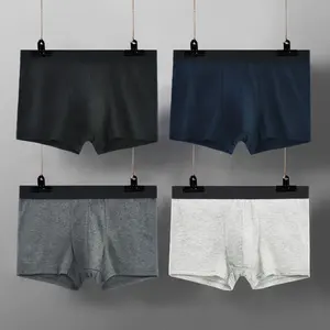 กางเกงบ็อกเซอร์ของผู้ชายแบบเรียบง่ายชุดชั้นในสั้นๆสีพื้นกางเกงบ็อกเซอร์ผ้าฝ้ายระบายอากาศได้ดี