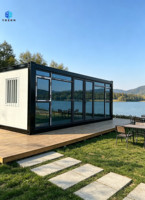 Maison conteneur préfabriquée en kit avec grande fenêtre vitrée, bureau conteneur modulaire et portable pour hébergement sur chantier