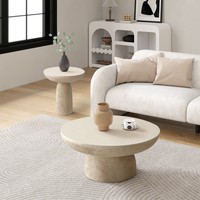Tables basses rondes en béton d'inspiration naturelle, finition texturée sable Table d'appoint centrale pour un usage quotidien
