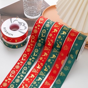 Rollos de cinta decorativa temática navideña con estampado dorado de 2,5 cm para envolver regalos y manualidades - Product Image 4