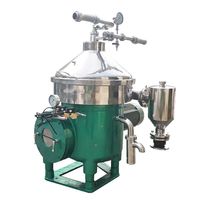 Centrifugeuse à disques biphasée