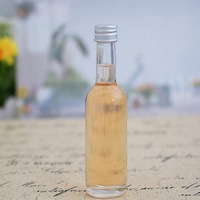 Bouteille en verre de 100ml pour vodka 30ml 50ml Mini bouteille en verre de liqueur d'alcool/vodka/sirop d'érable avec motif de feuille d'érable