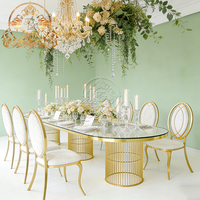 Table de salle à manger ronde de luxe moderne en verre trempé avec cadre en acier doré pour événements hôteliers et utilisation extérieure (vente en gros)