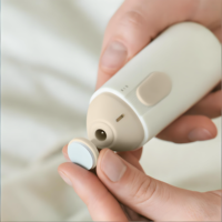 Lime à ongles électrique pour bébé, coupe-ongles pour nouveau-né avec 5 têtes de ponçage, design portable, lumière LED et moteur silencieux
