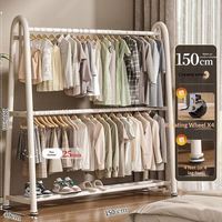 Porte-manteau mural de qualité supérieure pour la vente au détail, finition mate noire, construction en tube d'acier thermolaqué, support pour vêtements et objets décoratifs