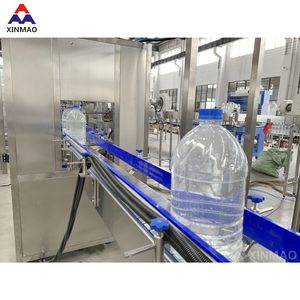 Machine d'embouteillage de capsulage de remplissage d'<span class=keywords><strong>eau</strong></span> pure automatique de type linéaire 4-4-1 500BPH de bouteille de <span class=keywords><strong>jerrican</strong></span> en plastique de 5 litres - Product Image 4