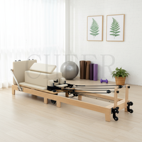 Machine de Pilates pliable en chêne avec cadre en bois massif pour la musculation à domicile et l'entraînement de renforcement du tronc - Vente en gros