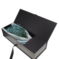 Boîte à fleurs élégante en forme de livre, en matériaux recyclés, avec ruban noir gaufré, pelliculage mat UV, insert en papier premium