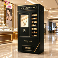 Distributeur automatique de bijoux et accessoires de beauté personnalisés avec écran tactile de 32 pouces, acceptant les paiements par carte de crédit et doté d'un système de levage