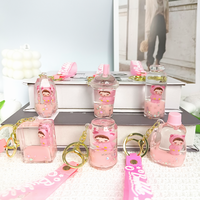 Porte-clés créatif personnalisé en acrylique avec impression UV, sablier rempli d'huile, pendentif ours rose rêveur, breloque de sac à dos en gros
