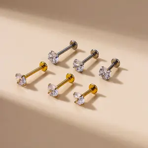 Juego de pendientes de tuerca de diamante de acero inoxidable chapado en oro 18G para mujer