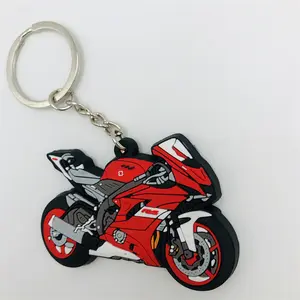 פופולרי המושך את העין לאורך זמן 2d קשה Pvc 3d Keychain עם מחבט