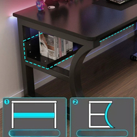 Bureau de jeu noir avec étagère de rangement et support pour processeur, poste de travail informatique simple avec éclairage RGB pour les joueurs